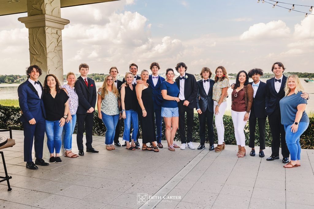 high school senior boys posing for prom pictures with their moms Lakeland, FL