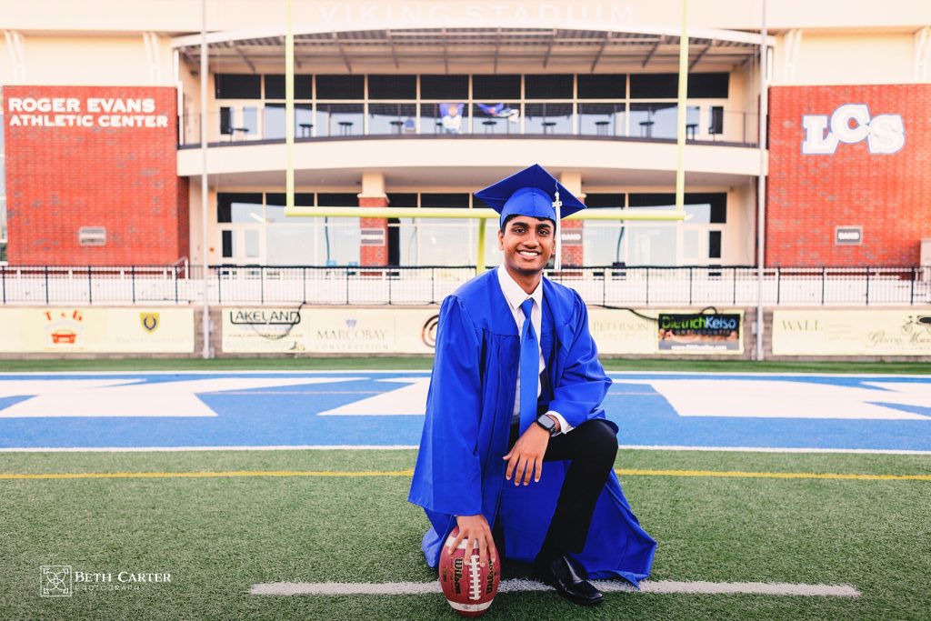 high school senior graduation cap and gown Lakeland Christian School Lakeland, FL - playing football