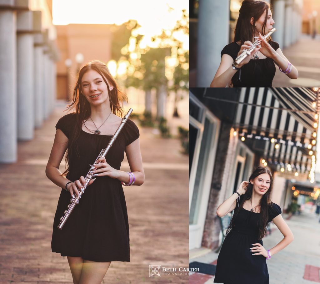high school senior girl with her flute in downtown Lakeland